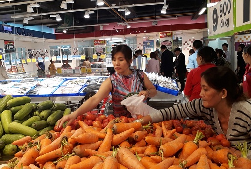 Hệ thống siêu thị Big C đẩy mạnh tiêu thụ hàng nông sản Việt. Ảnh: VGP/Lê Anh