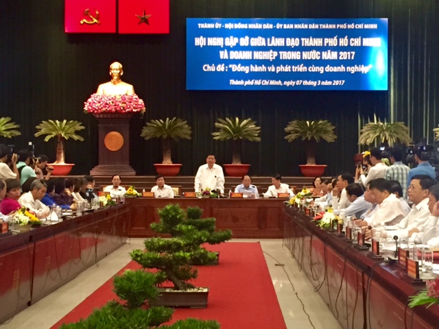 Bí thư Thành ủy TPHCM Đinh La Thăng phát biểu tại Hội nghị “Đồng hành và phát triển cùng DN”. Ảnh: VGP/Phương Liên