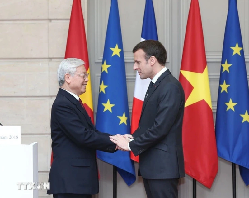 Tổng Bí thư Nguyễn Phú Trọng và Tổng thống Pháp Emmanuel Macron trong chuyến thăm chính thức của Tổng Bí thư đến Pháp năm 2018. (Ảnh: TTXVN)